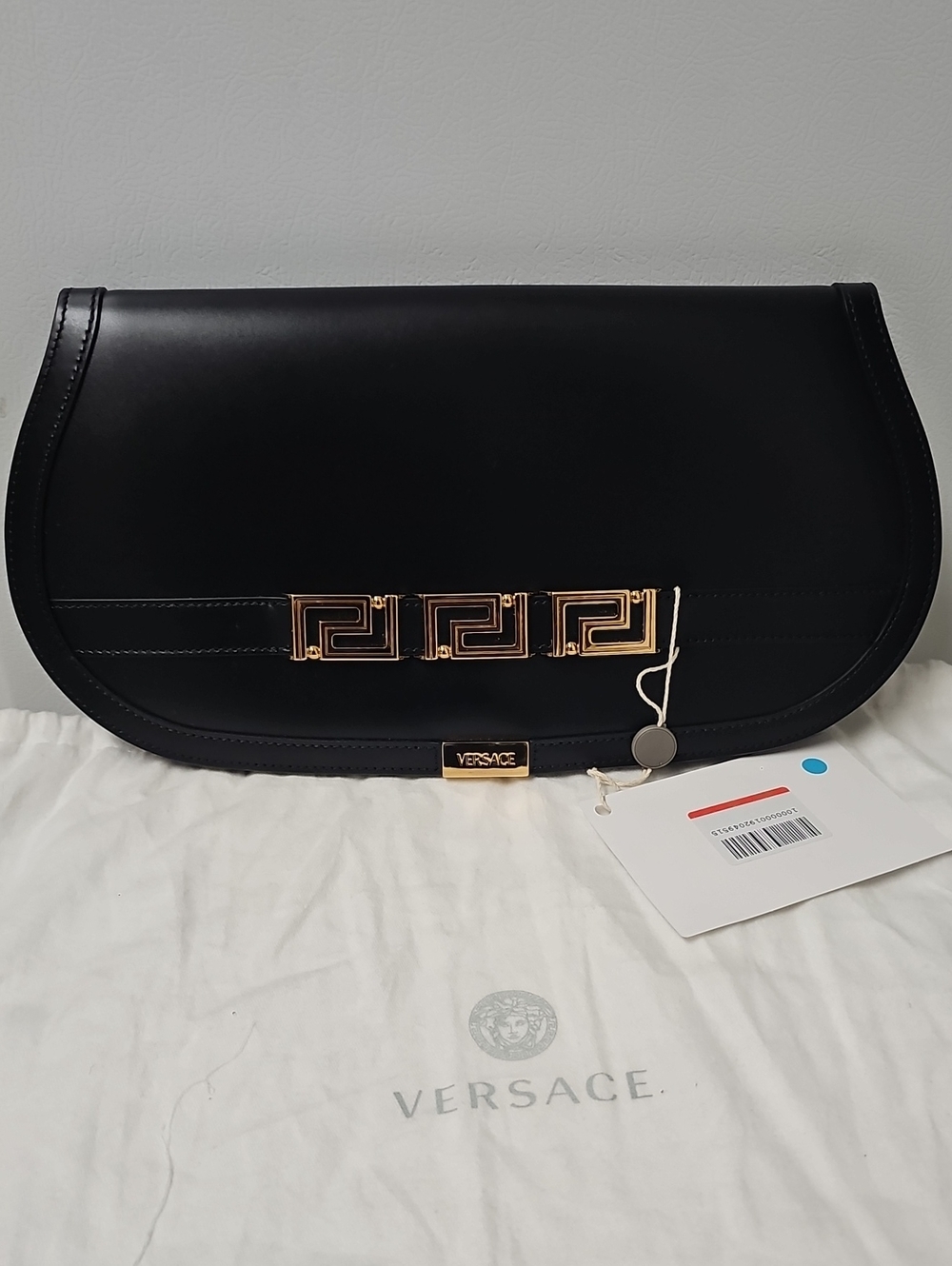 Versace Black Leather Clutch with Gold Greek Key Accent